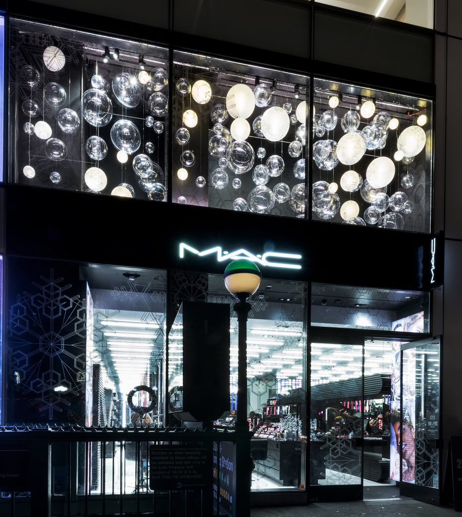 This ball installation we fabricated for MAC cosmetics in New York City was really eye-catching. We fabricated a mixture of mirrored and LED balls and installed them in the windows of MAC's first floor window. We then installed frosted vinyl in the shape of snow flakes onto the windows. A great holiday window design.