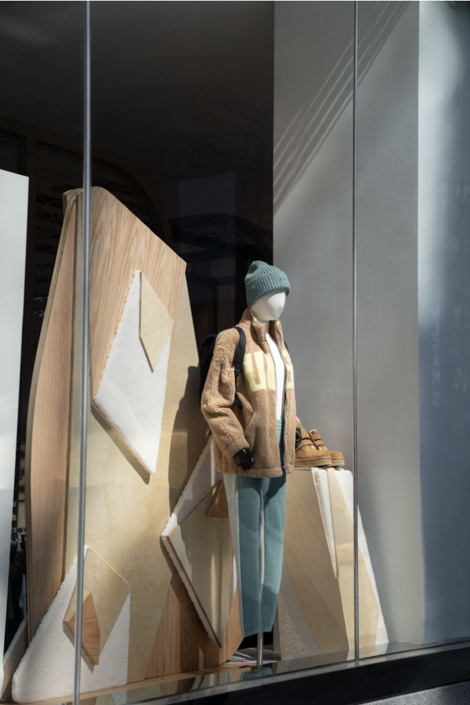 UGG Fall 2022 windows on 5th Avenue, New York City. We created geometric structures made from different types of wood, layering in the iconic UGG Sherpa as a nod to the brands iconic shoe. We created various sizes of plinths that mimicked the structures for continuity. The structures also had LEDs layered through the design, which makes for an eye-catching window display especially at night.