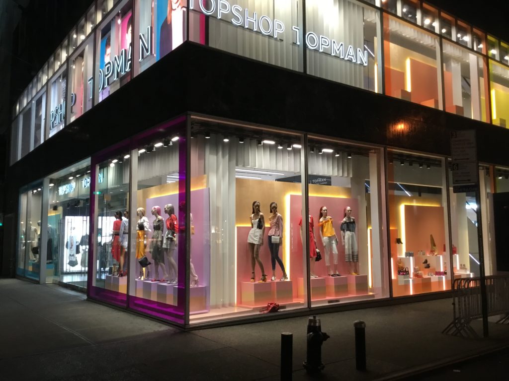 Visual Citi partnered with Topshop / Topman creative team to fabricate and install this simple and effective spring window scheme. We painted wooden panels in ombre hues and backlit with LED stripes to create this pastel sunset inspired window. We created this for their flagship location on 5th Avenue, New York City. We re-purposed the plinths we made for the holiday window scheme too.